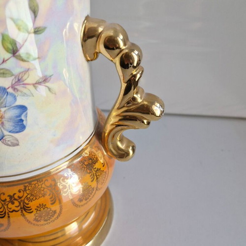 Porcelain vase vintage with floral and gold decorative elements