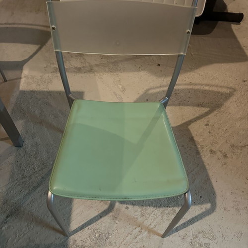 Glass dining table with extension and 4 used chairs, light green