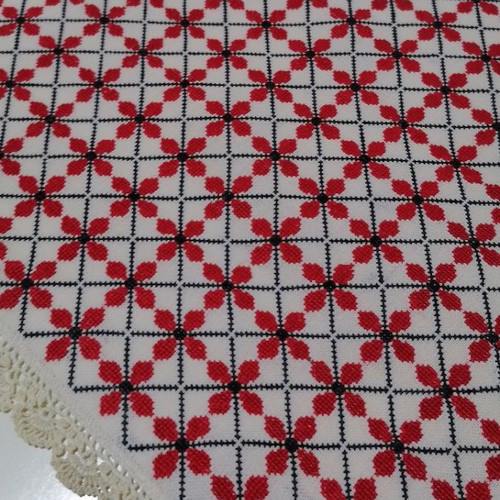 Large embroidered table runner used with handmade lace