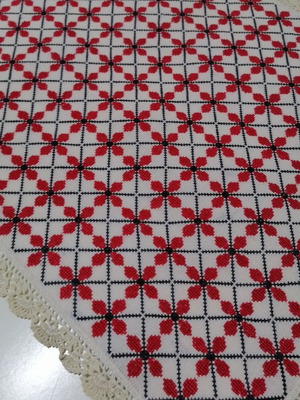 Large embroidered table runner used with handmade lace
