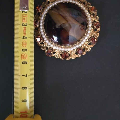 Vintage brooch and gold-plated earrings like new