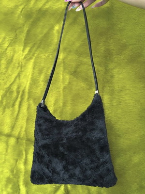Black fur handbag used