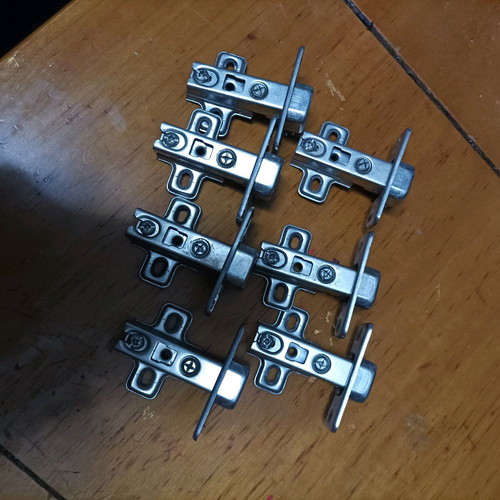 Cabinet hinges used, set of 7 pieces