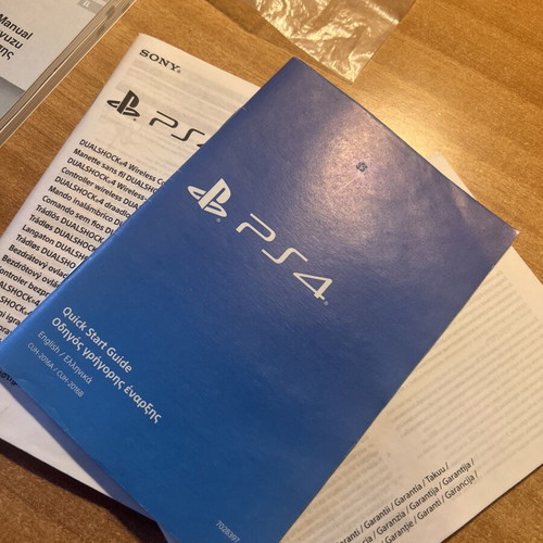 PS3 and PS4 manuals, one sealed