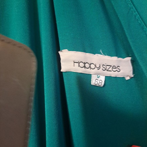 Happy Sizes green plus size jumpsuit with ruffle and rhinestones