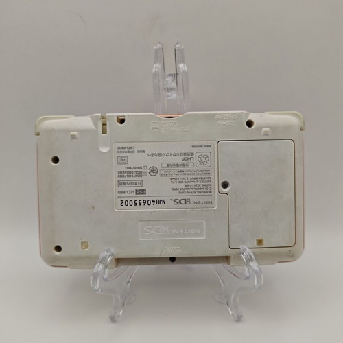 Nintendo DS pink handheld console used with charger and stylus