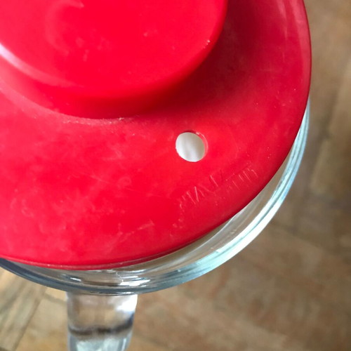 Glass jug with plastic lid used, retro style