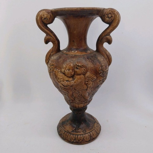 Ceramic amphora vase used, relief with cherubs