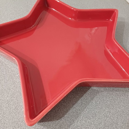 Star-shaped red plate used, 40cm