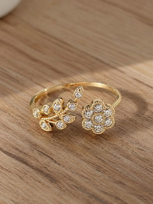 Adjustable gold flower and leaf ring with zircon