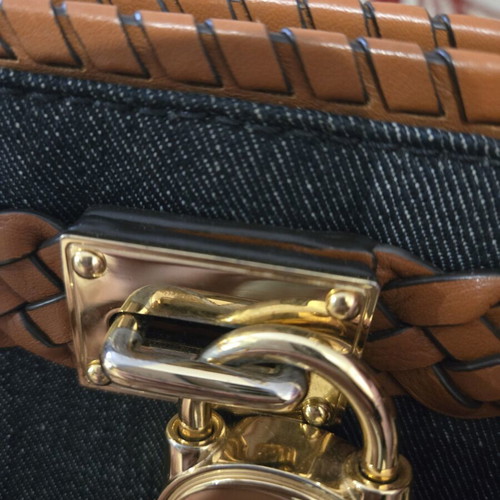 Michael Kors Denim Hamilton handbag used with leather details and gold lock