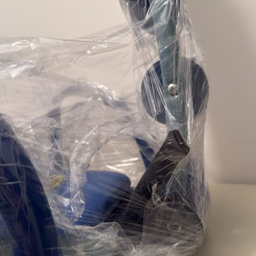 Abdominal Exercise Machine used with soft support cushions and comfortable arms