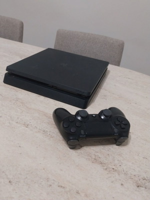 PlayStation 4 Slim 1TB like new with 2 games
