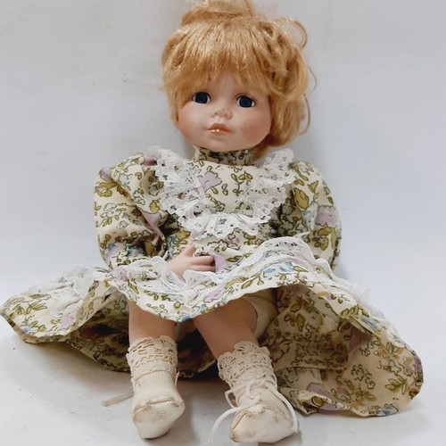 Vinyl doll 33 cm with elastic joints, blonde hair, dress and shoes, like new