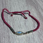 Red bracelet with eye like new