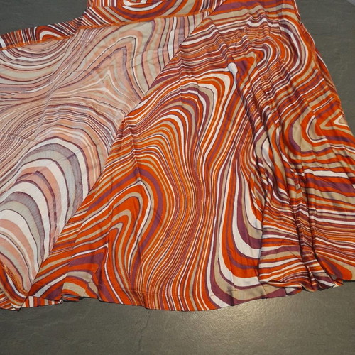Batida skirt used with color blocking in purple, orange, beige, white