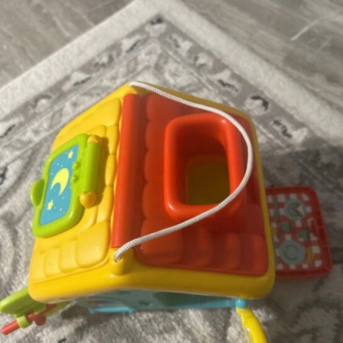 Educational Mobility Toy like new with wooden cat