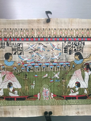 Painting on papyrus with Egyptian theme used