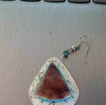Single earring used, beige and blue