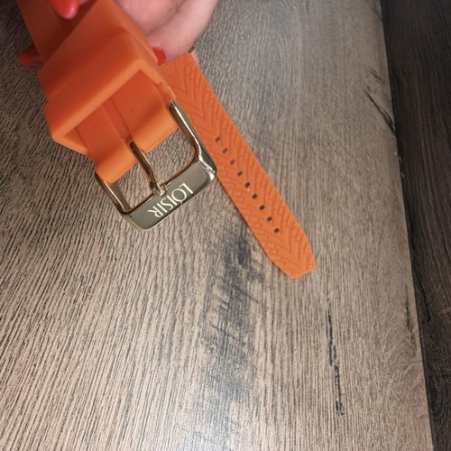 Loisir women's wristwatch like new, orange and gold