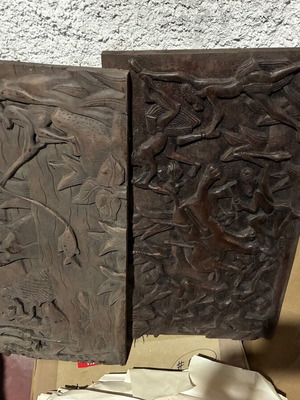 Wooden sculptures used from Africa with fishing and hunting scenes
