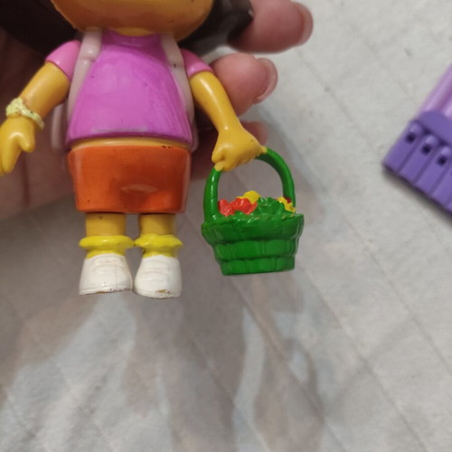 Dora the Explorer figures used, including backpack and magic flute
