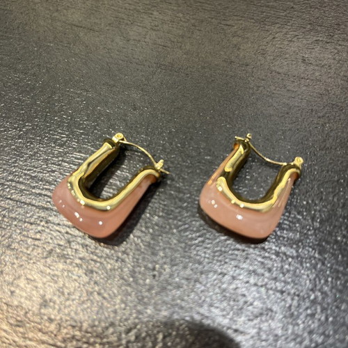 U-shaped earrings with gold finish and pink enamel, like new