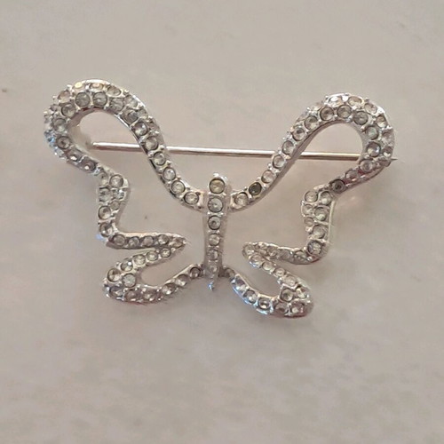 Swarovski pin used, missing two stones, silver