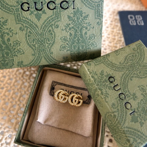Gucci Double G gold tone earrings 2 in 1
