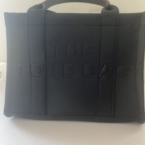 Black handbag like new, small with shoulder strap