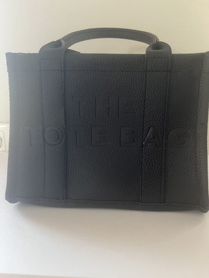 Black handbag like new, small with shoulder strap