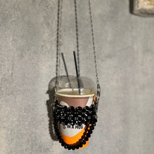 Cup holder handmade with black and silver beads