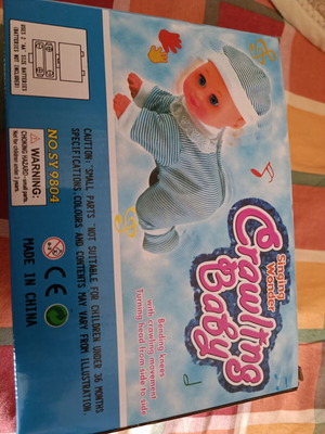 Crawling and Singing Baby Doll like new