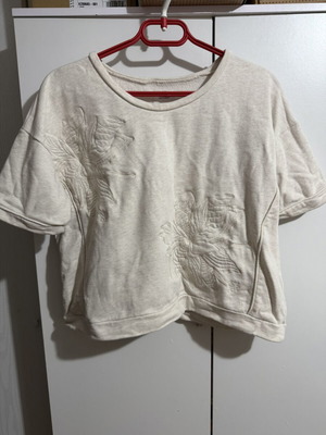 Beige blouse size L with floral embroidery