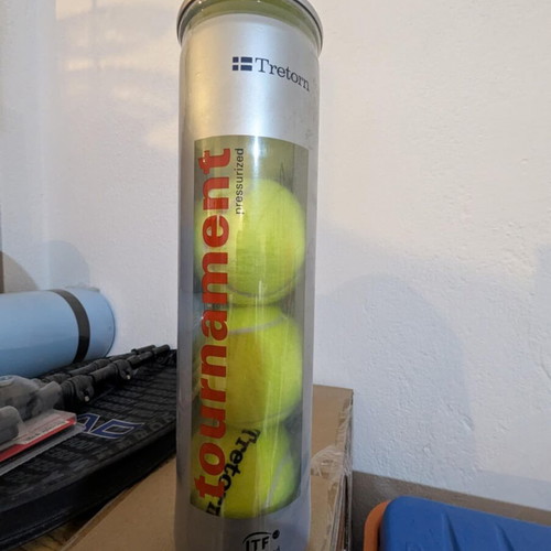 HEAD tennis racket with balls used