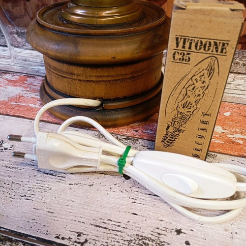 Rustic old lamp with Edison filament bulb used