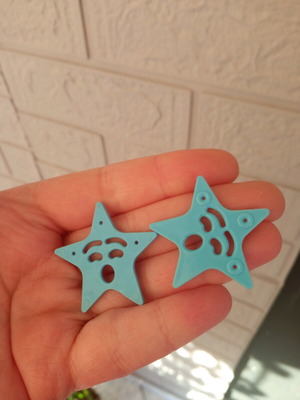 Two blue star toys like new