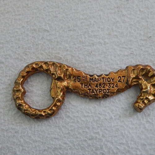 Polyfota V. Lampridis metal promotional bottle opener from 1960s like new