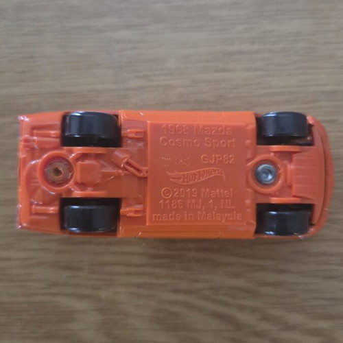 Hot Wheels 1968 Mazda Cosmo Sport orange racing line, like new