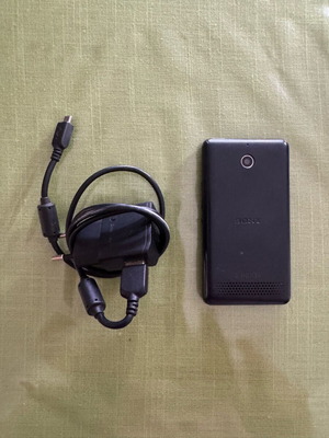 Sony Xperia E1 4GB black used, for parts with charger