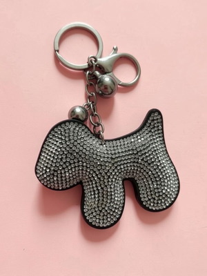 Dog-shaped keychain like new, black and silver