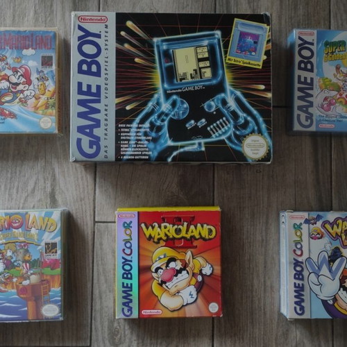 Gameboy original console with 5 complete games used, English versions