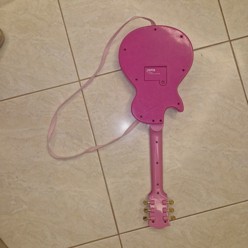 Children's guitar with sound like new