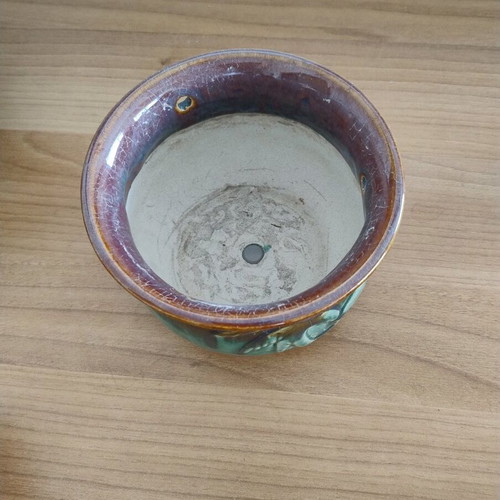 Flowerpot with holes for hanging used