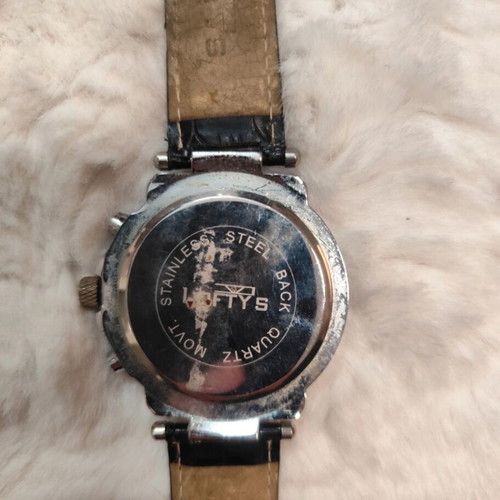 Lofty's men's watch used with worn strap and scratches