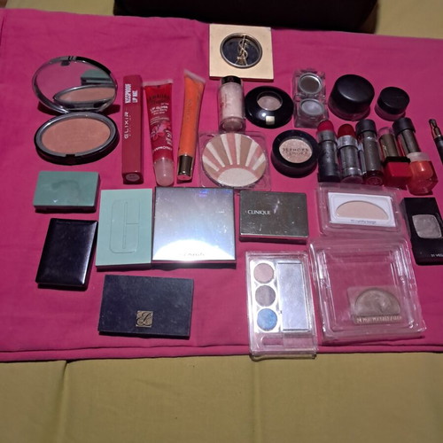 Large collection of branded cosmetics with YSL mirror and makeup bag
