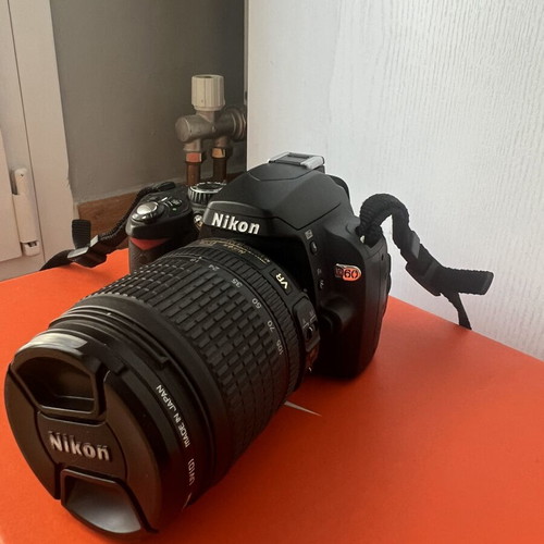 Nikon D60 camera kit used with 18-105mm VR lens, 2 batteries, cards, bag