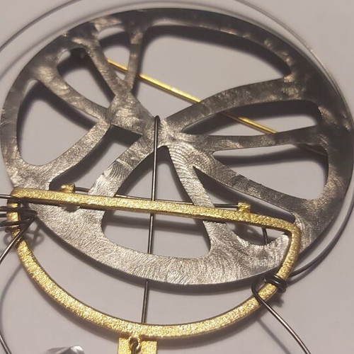 Handmade brooch new, gold and silver colors