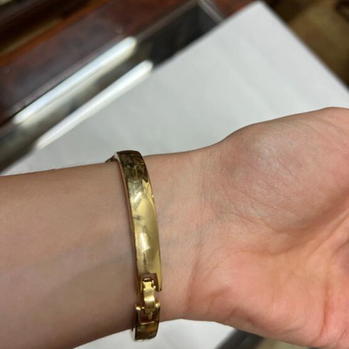 Bracelet like new with black and gold design