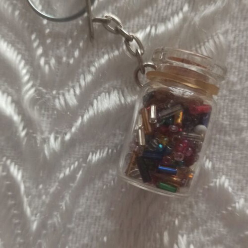 Keychain in glass jar with colorful beads like new